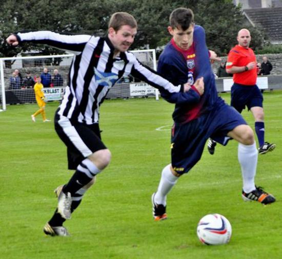 Photograph of Macadie penalty tips balance in spot kick controversy